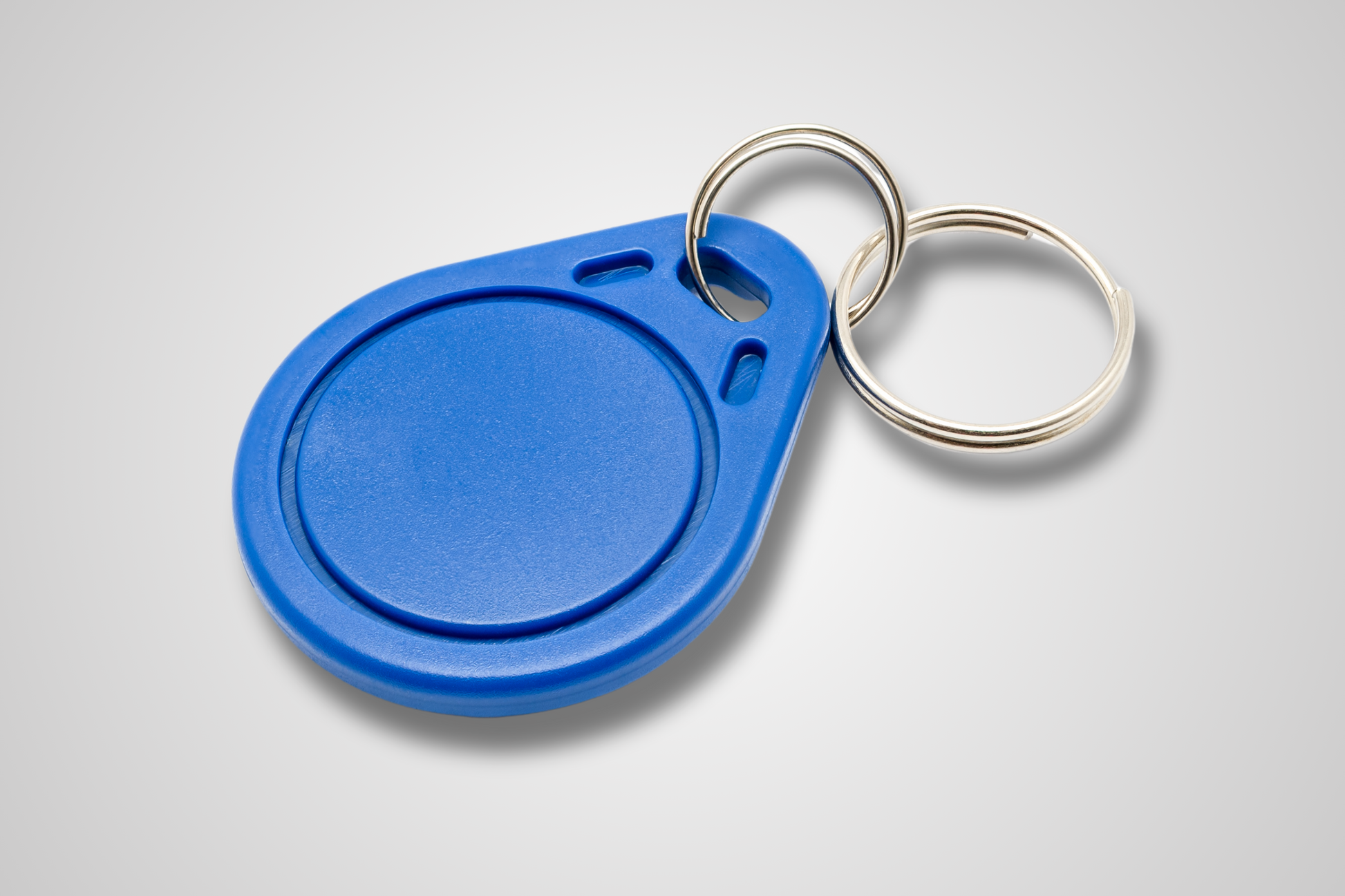 A photo of NFC Key Fob from JM Band®. Purchase RFID in Blue here.