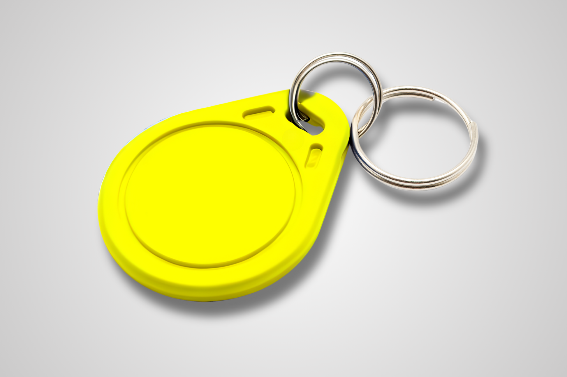 A photo of NFC Key Fob from JM Band®. Purchase RFID in Yellow here.