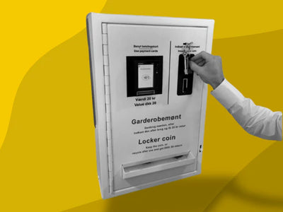 Monetų įnešimo aparatas