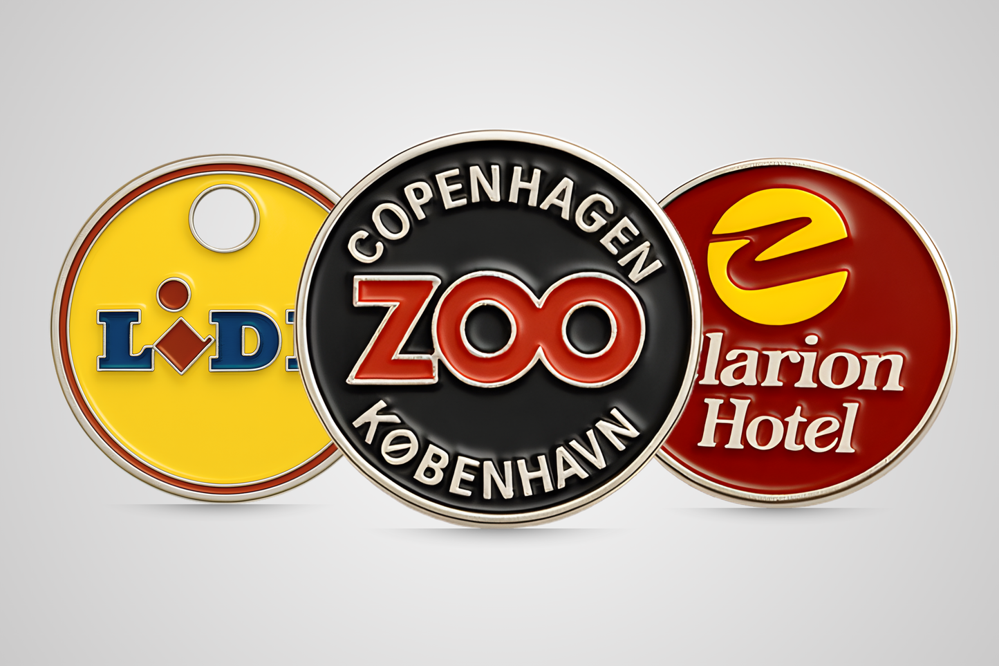 Individualūs vežimėlio žetonai su JM Band® logotipu.