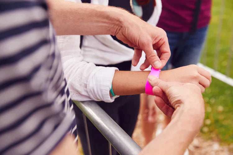 close up of friends at entrance to music festival